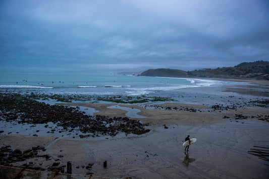 Surfer on a San Francisco Beach